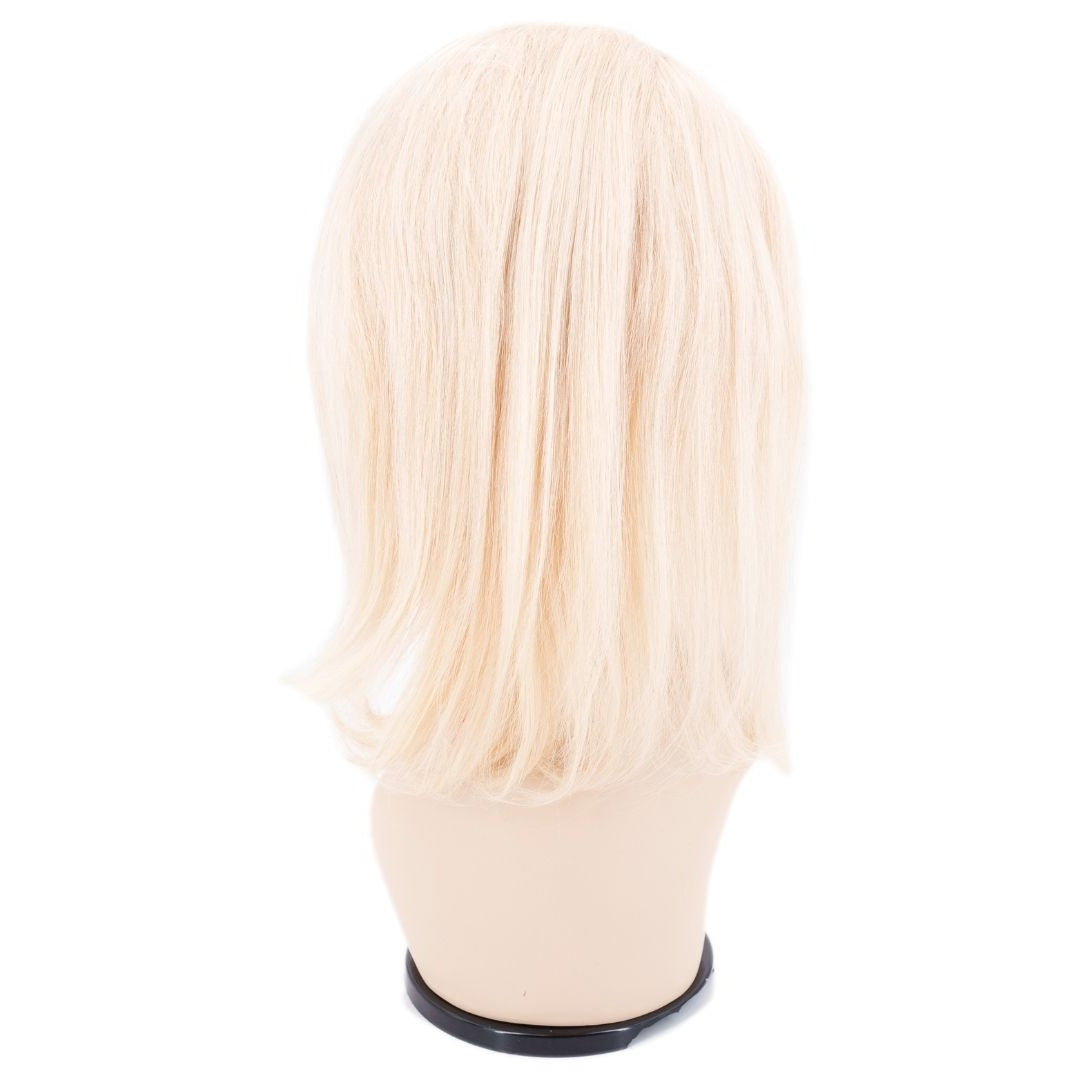 Back of a blonde straight bob human hair wig on a mannequin head against a white background showing the length and the blunt line