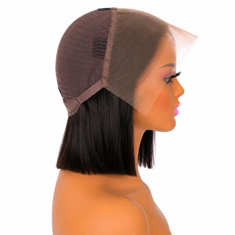 Brown cap of a natural black straight bob human hair wig turned back on a mannequin showing combs, an adjustable strap and the lace panel