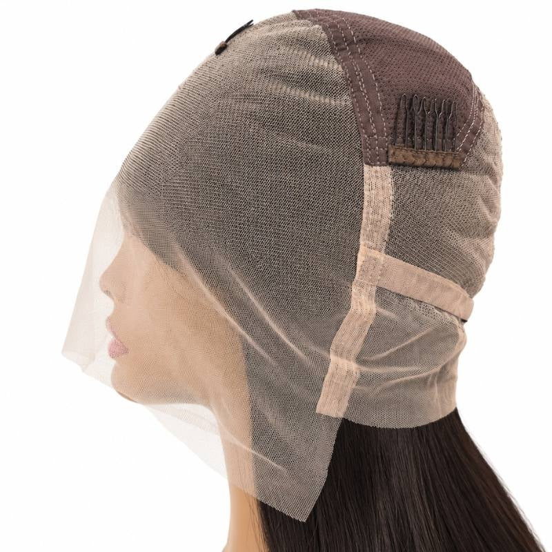 Side view of the lace cap on a natural black straight human hair wig turned inside out showing a comb, elastic band and stitched seams
