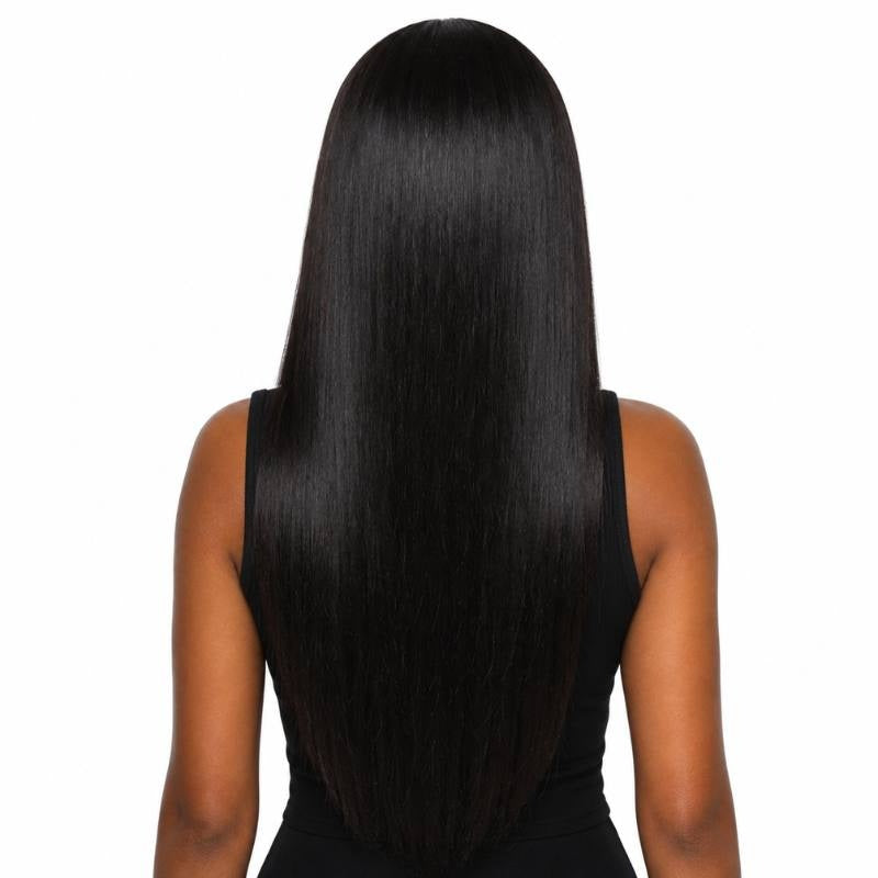 Back view of a model wearing a long natural black straight human hair wig showing the full length and even ends on white
