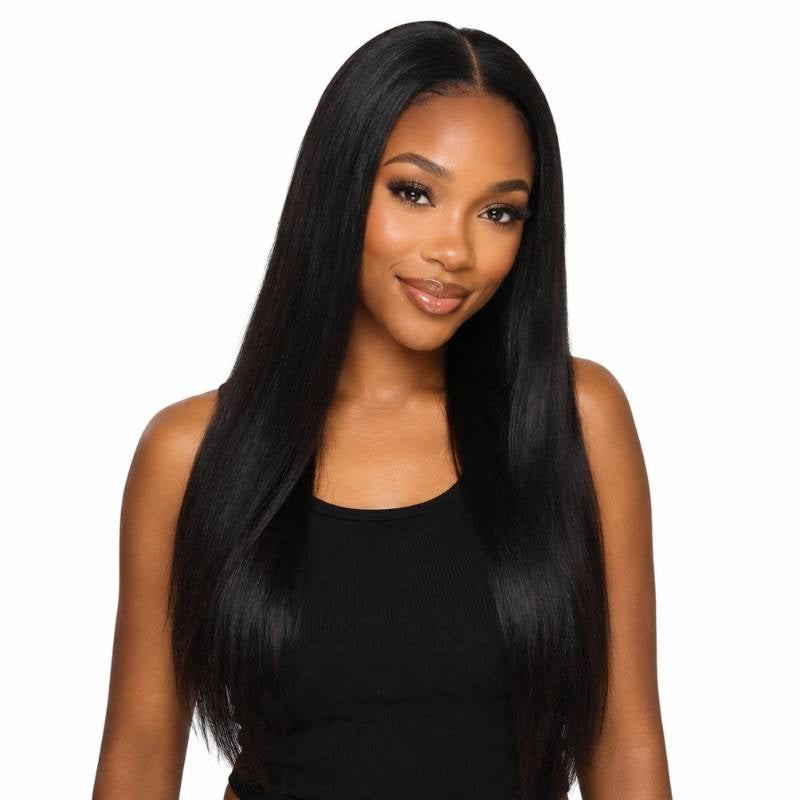 Model facing forward wearing a long natural black straight human hair wig with a middle part against a white background