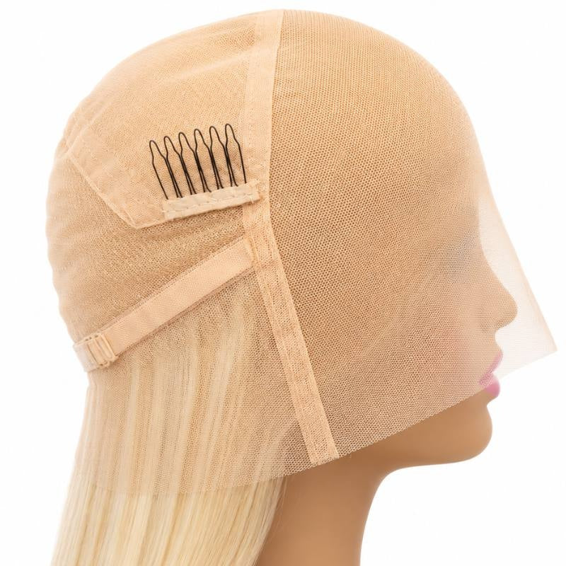 Side view of the lace cap on a blonde 613 straight human hair wig turned inside out showing a comb, elastic band and seam lines