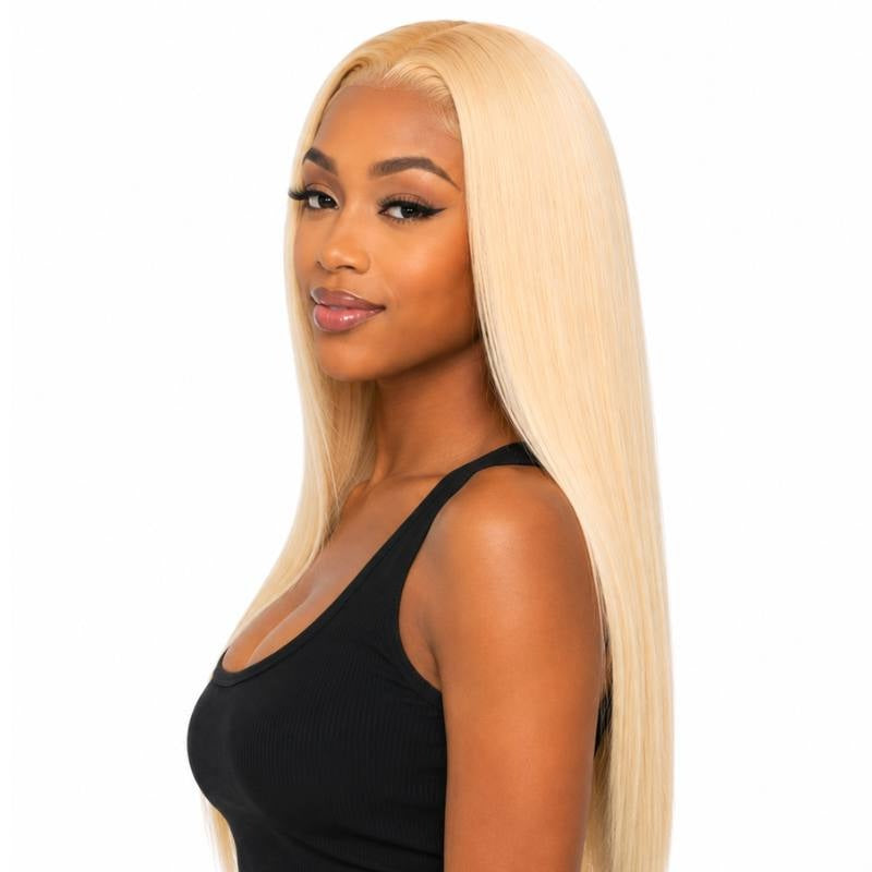 Model turned to one side wearing a long blonde 613 straight human hair wig with a middle part on a white background