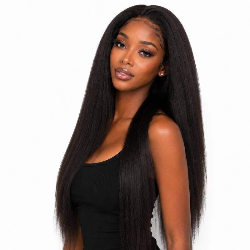 Model wearing a long natural black yaki straight human hair wig with a middle part and hair falling past the waist on white