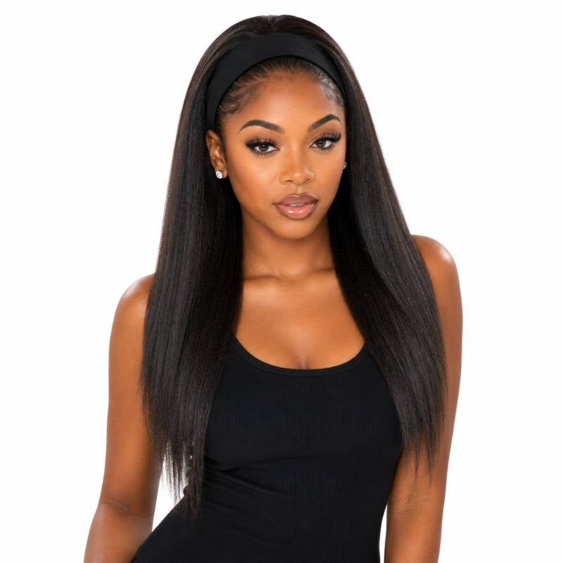 Model facing forward wearing a natural black yaki straight human hair wig with a black fabric headband across the hairline