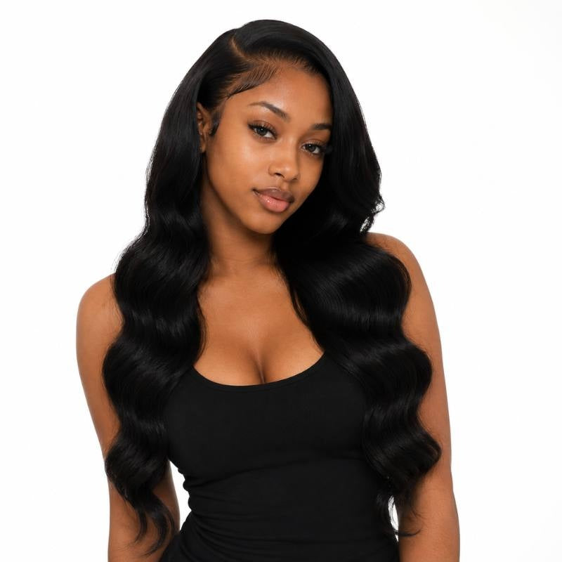 Model facing forward wearing jet black 1 body wave sew-in hair extensions with a middle part and long waves on white