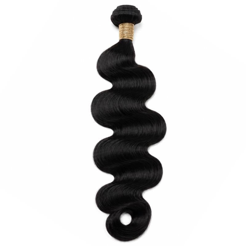 Single bundle of jet black 1 body wave sew-in hair extensions hanging on white with a gold band wrapped at the weft