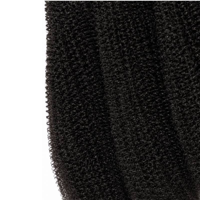 Macro crop of the tight coil pattern in natural black 1B afro kinky curly sew-in hair extensions filling the frame