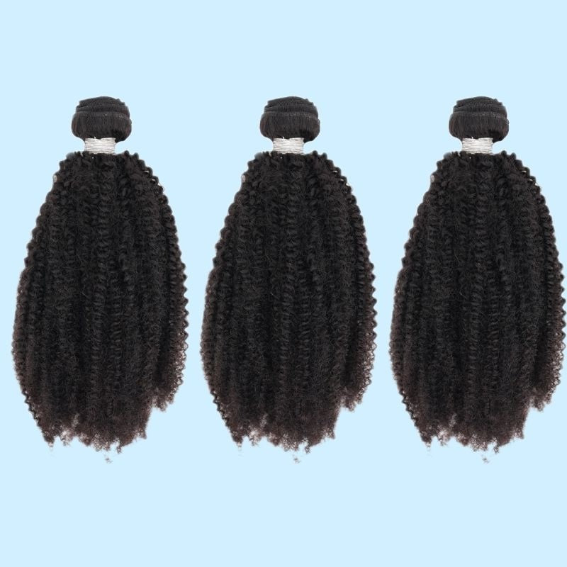 Three bundles of natural black 1B afro kinky curly sew-in hair extensions lined up on a pale blue background with white bands at the wefts