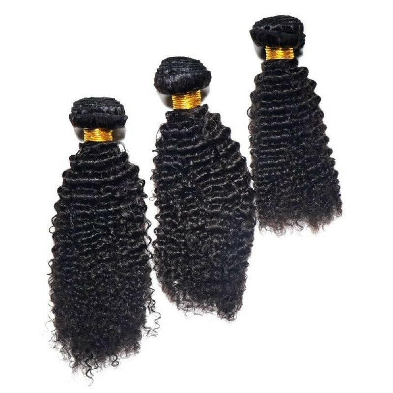 Three bundles of natural black 1B afro kinky curly sew-in hair extensions arranged at staggered heights with gold bands at the wefts