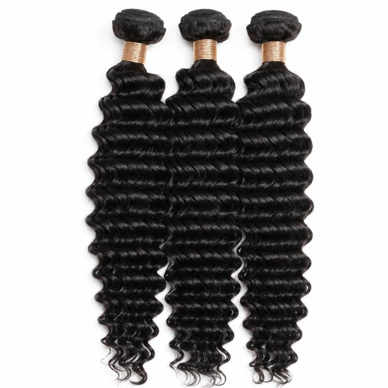Three overlapping bundles of natural black deep wave sew-in hair extensions on white with tan thread wrapped below each weft