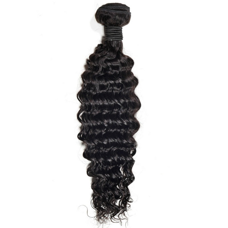 Single bundle of natural black deep wave sew-in hair extensions hanging on a white background with the folded weft tied at the top