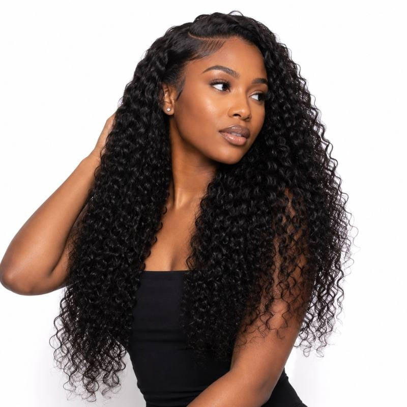 Model wearing long natural black kinky curly sew-in hair extensions with a side part and one hand lifted into the hair on a white background