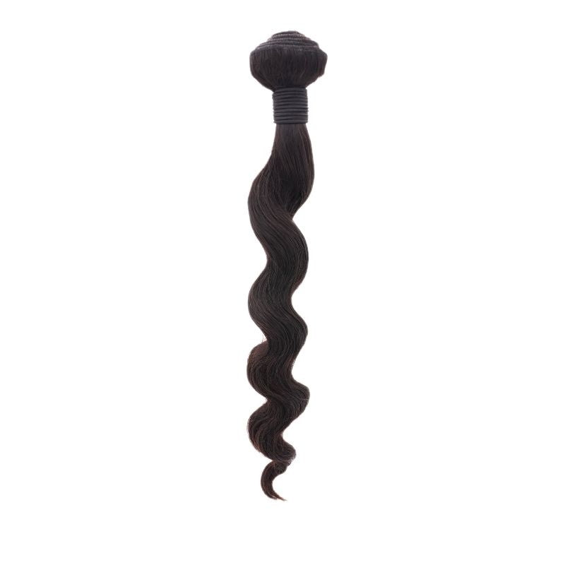 Single bundle of natural black loose wave sew-in hair extensions hanging on a white background with a thread wrapped weft at the top
