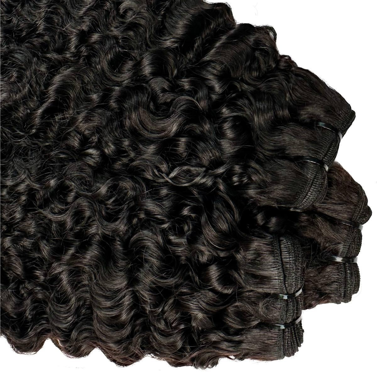Burmese Curly Human Hair Bundle Deal - bundles stacked, wefts at right