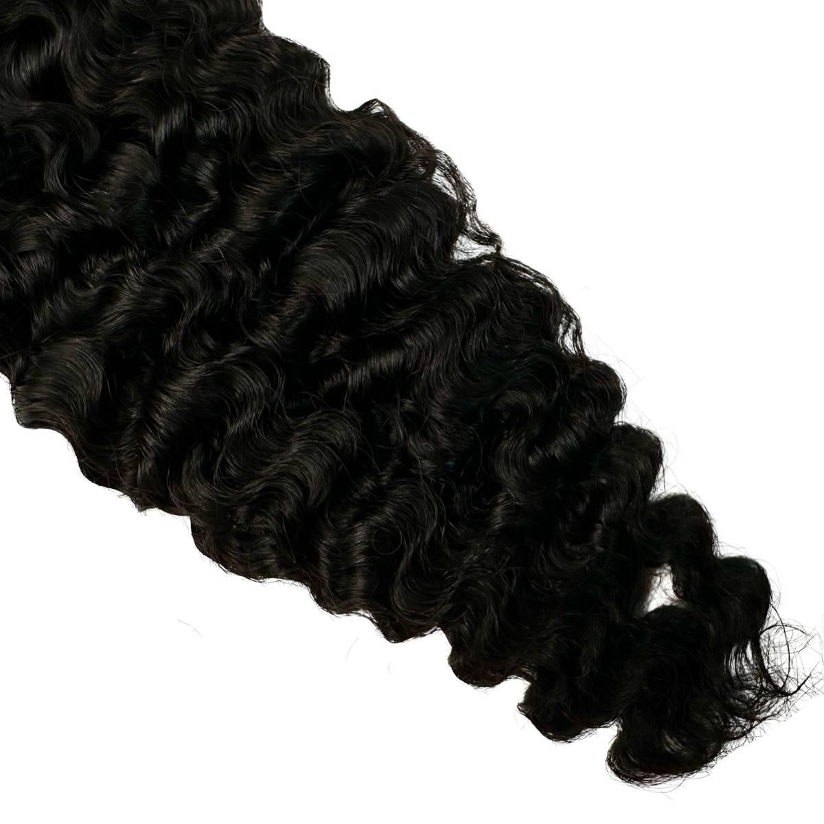 Burmese Curly Human Hair Bundles - curl tips close-up on white