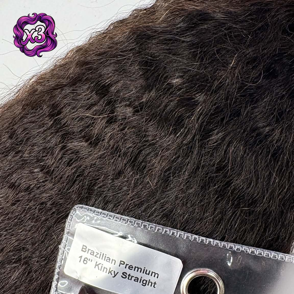 3 bundle deal — Close-up of 16 inch Brazilian kinky straight sew-in hair extensions bundle with product label showing yaki texture detail