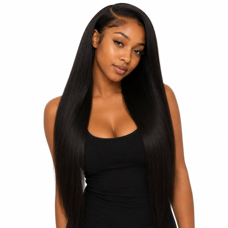 Model on a white background wearing long natural black straight sew-in hair extensions with a deep part and laid edges at the hairline