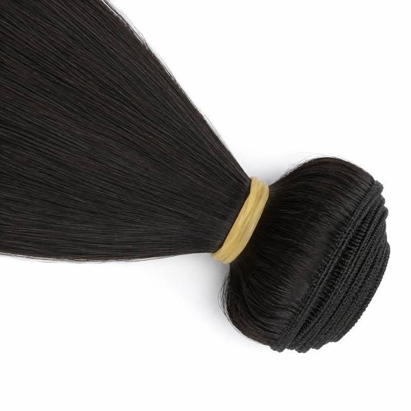 Close-up of the folded weft on natural black straight sew-in hair extensions gathered by a yellow elastic band with the hair fanning out