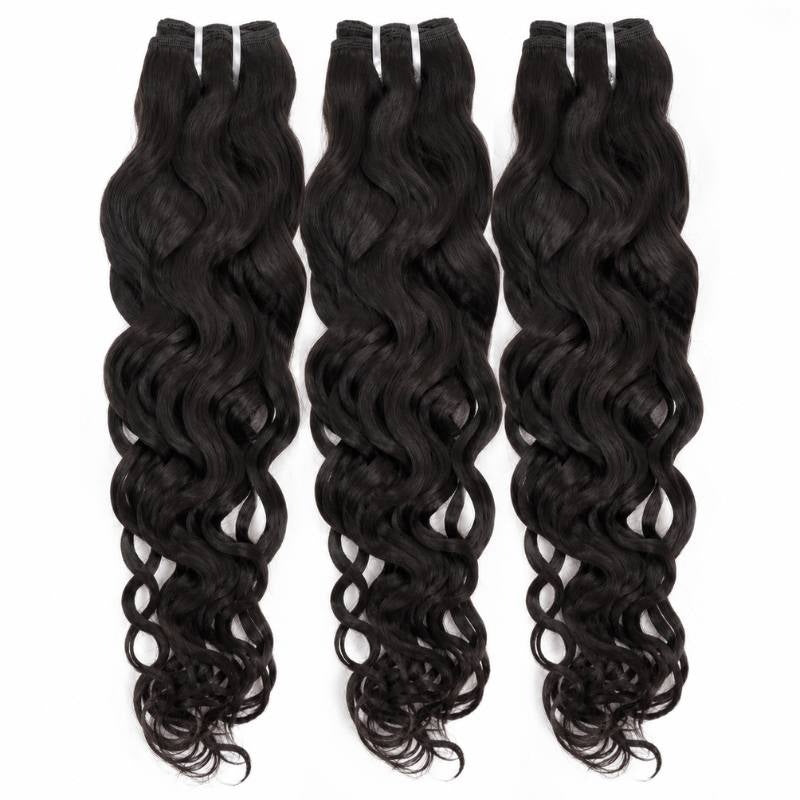 Three wefts of natural black sew-in hair extensions shown full drop on a white background with loose spiral waves through the lengths