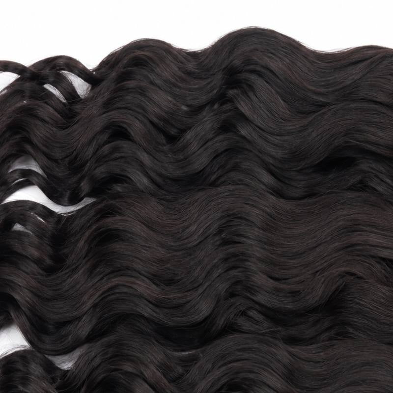 Macro view of natural black sew-in hair extensions showing rows of even waves running across the frame