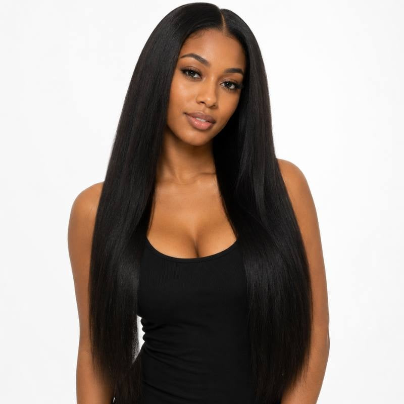 Model wearing long natural black yaki straight sew-in hair extensions with a middle part, photographed from the front against white