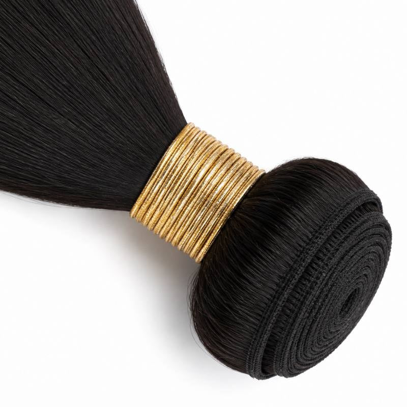 Close-up of the coiled stitched weft and gold thread binding on natural black yaki straight sew-in hair extensions