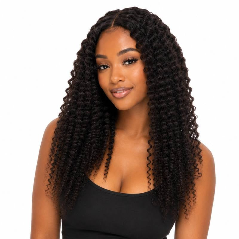 Model wearing long natural black afro kinky coily tape-in hair extensions falling past the shoulders, photographed from the front