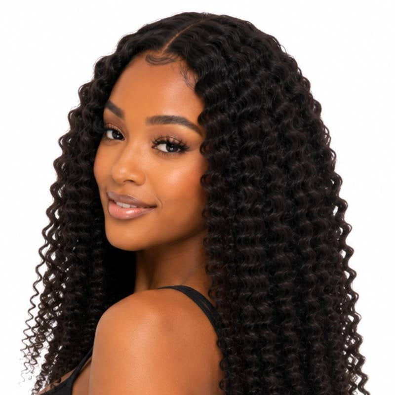 Model turned over the shoulder showing natural black afro kinky coily tape-in hair extensions with a middle part and defined curls