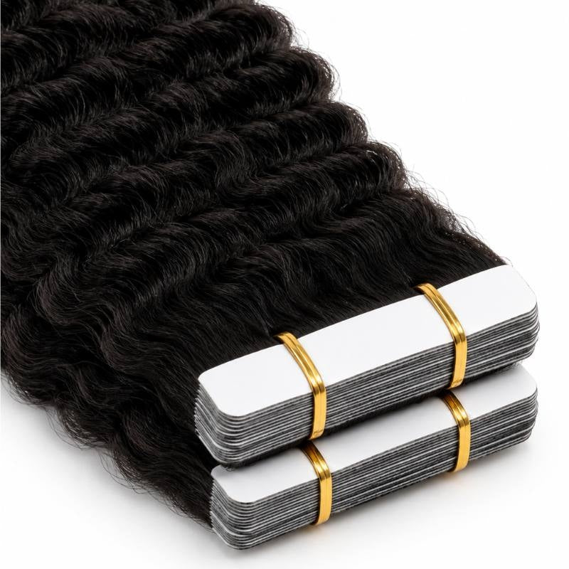 Close-up of two stacked sets of natural black afro kinky coily tape-in hair extensions showing the white adhesive tape tabs banded together