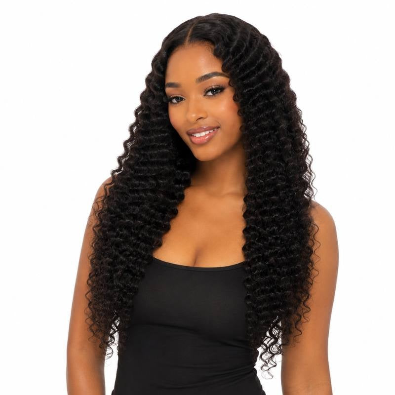 Model wearing natural black afro kinky curly tape-in hair extensions with a middle part, front view against a white backdrop
