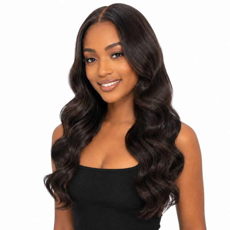 Model wearing long natural black body wave tape-in hair extensions with a middle part, photographed from the front