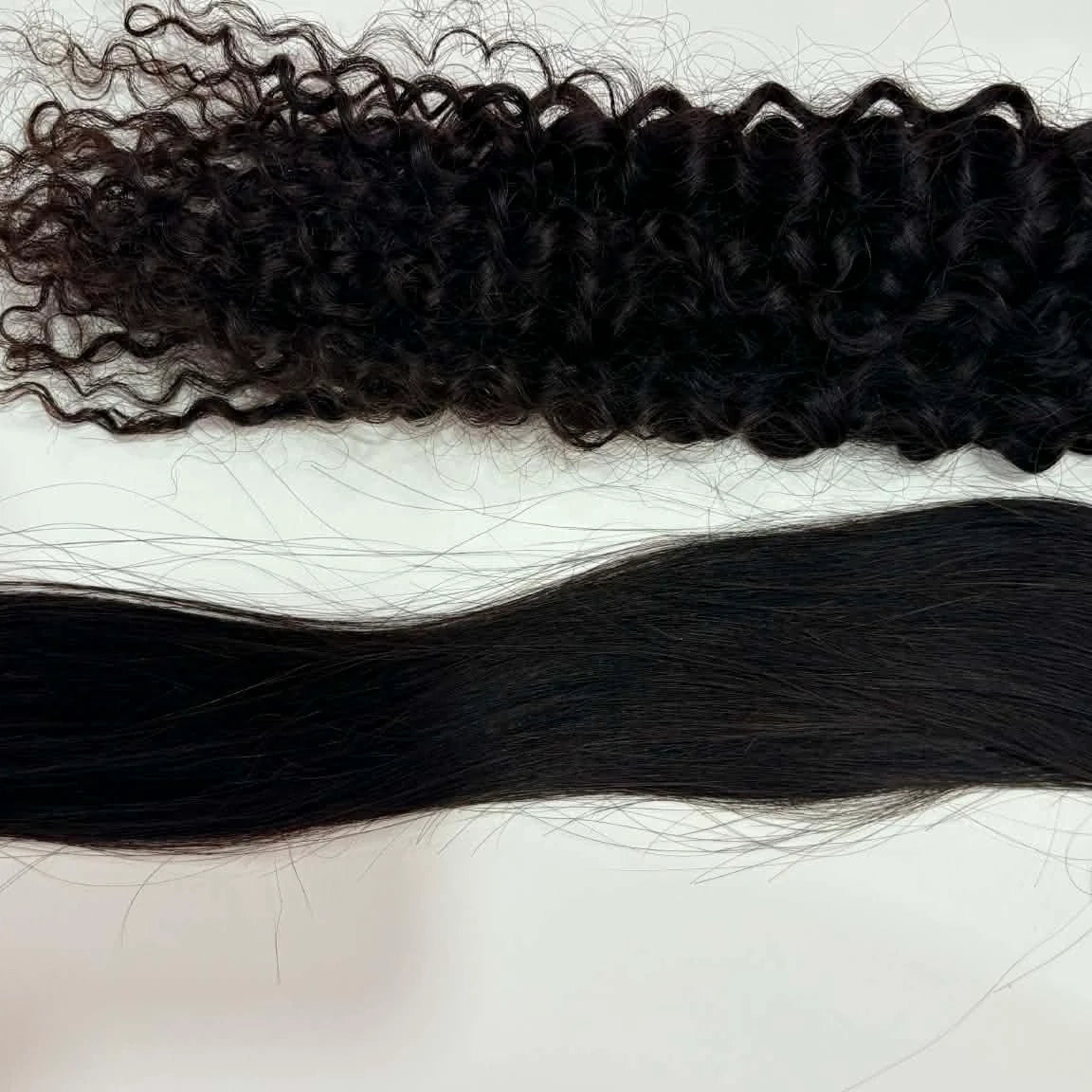 Texture comparison of 16 inch kinky curly 3B-3C tape-in hair extensions next to straight tape-in hair extensions showing curl pattern difference